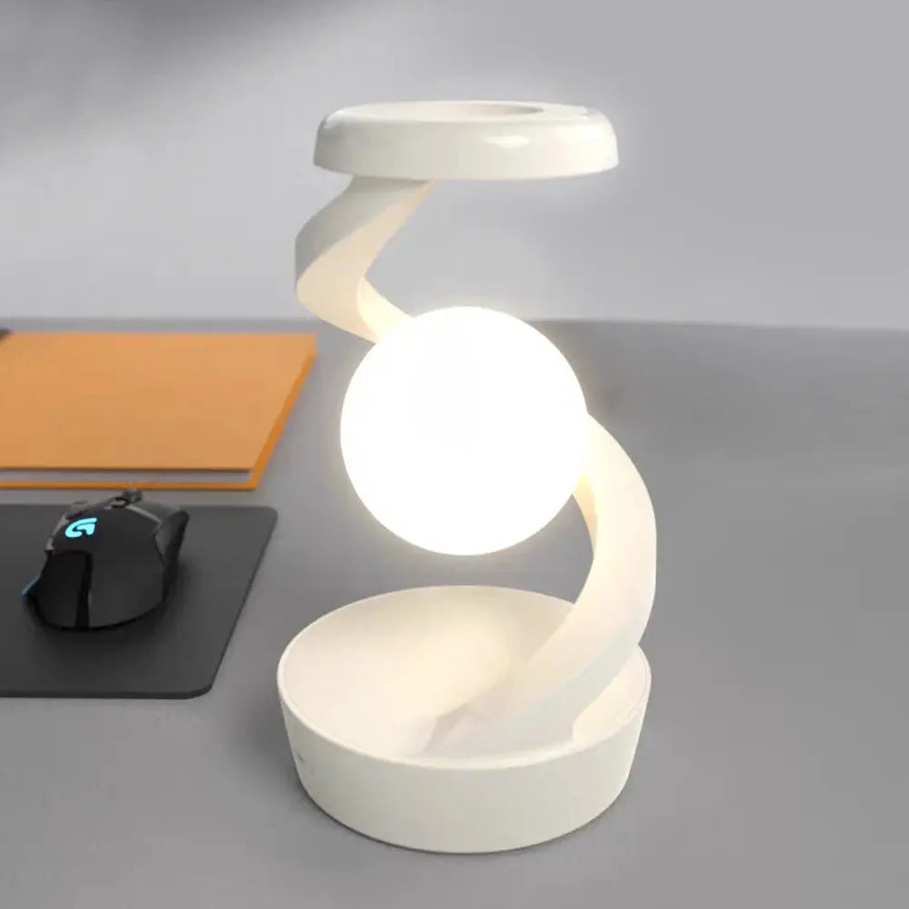 Veilleuse LED rotative à 360° avec chargeur sans fil - Malanterne.fr